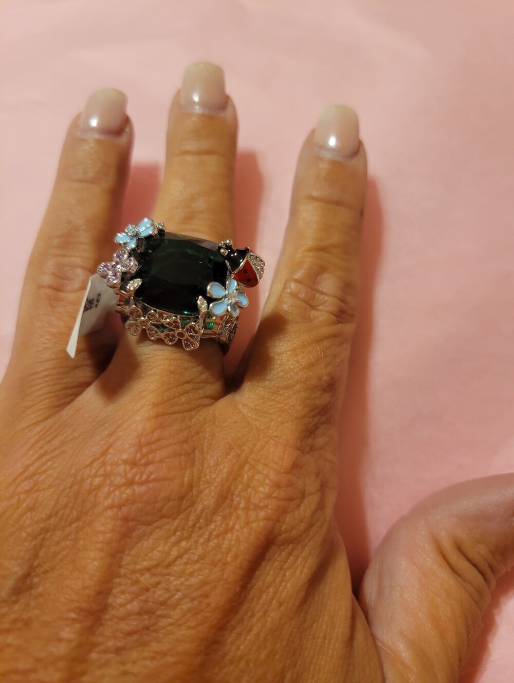 Silver Floral Cocktail Ring with Dark Green Stone